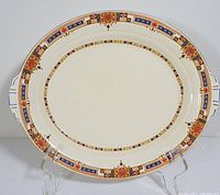 Full view of the oval serving platter displaying overall shape and decoration.