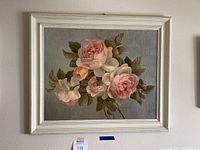 Full view of framed acrylic print showing pink roses on gray background with a white wooden frame and auction lot number 116 beneath.