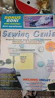Close-up of Sewing Genie Professional Style Sewing Machine boxed with product details and bonus mini-stitcher included