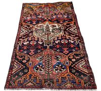 Full view of Bakhtiar rug on white background