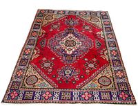 Full view of red field and medallion pattern