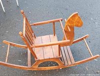 Side and top views of the vintage wooden rocking chair with horse head, showing seat, armrests, backrest, footrest and rocking base detail.