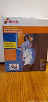 Boxed Kidde emergency escape ladder with multi-language labeling and image showing ladder usage.