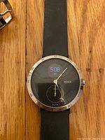 Front view of Nokia hybrid smartwatch showing analog and digital time display.