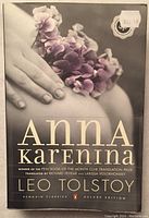 Front cover of the deluxe edition of Anna Karenina by Leo Tolstoy, showing the title, author, and translator credits.