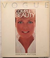 Front cover of Vogue Complete Beauty book showing title, author, and image of a woman's face.