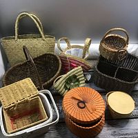 Photo showing the entire variety of small baskets, highlighting different shapes, sizes, and materials.
