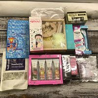 Top view of the full lot showing all items arranged on wooden surface