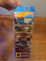Front view of unopened Hot Wheels blister pack with five cars inside