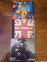 Front covers of the three The Who CD albums stacked vertically.