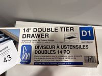 Box top of Feeny 14 inch double tier drawer organizer showing product name, dimensions, fit specifications and barcode.