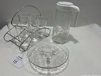 Full set showing glass Tang jug with floral etched design, six clear glasses in chrome metal holder, and footed etched cookie/cake plate.