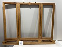 Full view of the wooden hinged frame showing three connected panels and the total size dimensions roughly 39 by 30 inches.