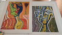 Two paintings side by side showing abstract expressionist faces in vivid colors.