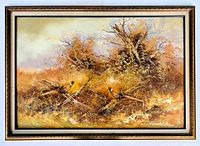 Front view of the detailed vintage oil painting showing two pheasants in an autumn landscape framed in a vintage wood frame.