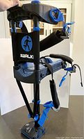 Full view of iWALK 3.0 knee crutch showing padded knee platform, black padded calf strap, blue adjustment mechanisms and foot platform.