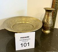 Photo showing vintage brass vase and candy dish side by side on a surface with a ruler for scale.