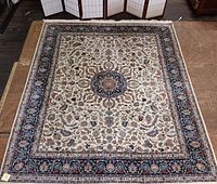 Full view of the rug laid flat, showing overall design and condition