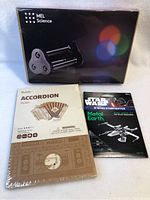 Box of MEL Science optics kit in black packaging with colored lights graphic