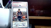 Front view of the 2009 Joe Johnson basketball card in clear encapsulation, showing Joe Johnson in his Atlanta Hawks jersey.