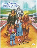 Color photo showing The Wizard of Oz characters with signatures and inscriptions by Mickey Carroll, Jerry Maren, and Karl Slover.