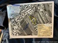 Full 11x14 photo showing the signed aerial view of Abbottabad compound with PSA COA visible.