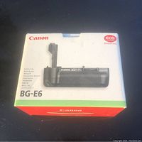 Canon BG-E6 battery grip original box showing front image and product name.