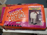 Box for the 2-person camel costume showing the design and branding