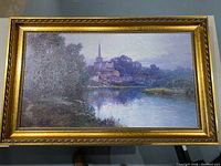 Framed canvas print showing full artwork and gold ornate frame