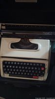 Photo showing the white and black Sears Brother Manual 2 manual typewriter with keyboard and top platen visible.