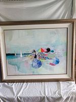 Full view of the framed acrylic painting showing a beach scene with sailboats and colorful umbrellas.