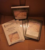 Photo showing three DVD cases and three course booklets for Masterpieces of Ancient Greek Literature by David J. Schenker from The Great Courses.