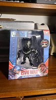 Front view of unopened Black Panther die cast figure in original box with Marvel Civil War graphics.