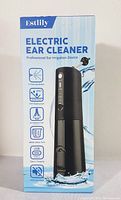 Photo of the front of the packaging showing the electric ear cleaner device and key features including 3 cleaning modes, IPX7 waterproof, 8 irrigation tips, 280ml water tank, USB Type-C charging, and ultra low noise.
