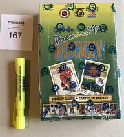 Front view of the factory-sealed OPC Premier 1992-93 hockey card wax box showing box artwork and multiple card images.