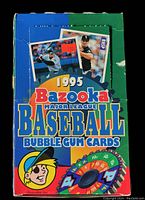 Blue and green cardboard box labeled 1995 Bazooka Major League Baseball Bubble Gum Cards, featuring images of baseball players and colorful graphics