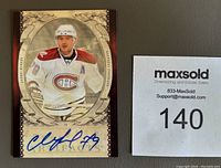 Front of Andrei Markov autographed hockey card showing player image, Montreal Canadiens uniform, and autograph in black Sharpie.