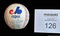 Baseball face showing Montreal Expos logo and several facsimile autographs