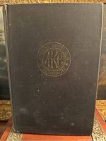 Front cover of the 1945 American Kennel Club The Complete Dog Book showing dark blue cloth cover with gold AKC emblem.