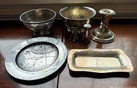 Six-piece group view: filigree basket, footed bowl, candlestick, shakers, round plate, rectangular tray