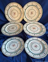Full view of 6 vintage Coalport porcelain plates showing design and size