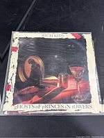 Front cover of 'Ghosts of Princes in Towers' vinyl showing original artwork with wear, tape and edge damage.