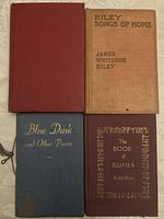 Top view of the four hardcover books arranged in a square showing front covers.
