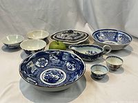 All nine pieces arranged with green apple for scale