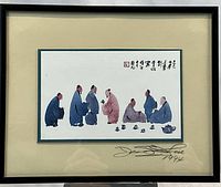 Full front view of framed watercolor on easel against white backdrop