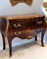 Front view showing overall shape, two drawers, marble top, wood veneer and ormolu hardware