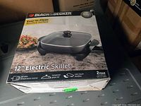 Photo of Black & Decker 12-inch electric skillet box showing front with image and features
