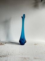 Front view of tall blue Viking glass vase with drape pattern, showing full slender neck and bulbous base.