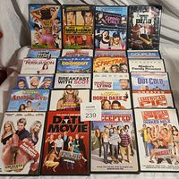 DVD lot showing 22 comedy movie DVD cases laid out in rows, titles clearly visible.