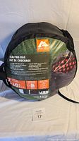 Ozark Trail sleeping bag packed in a compression sack displaying brand label and temperature rating -10°C.